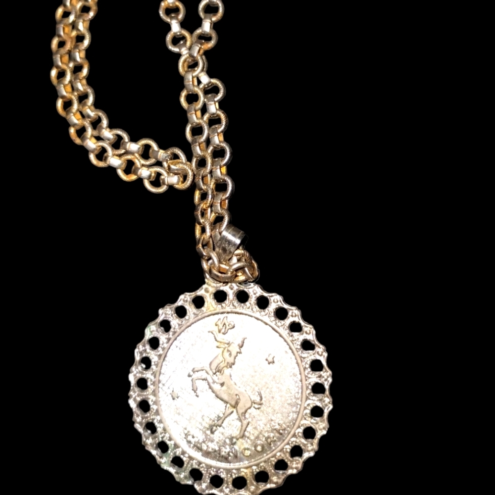 1960s old Capricorn silver necklace, and in excellent shape
